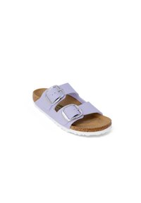 Purple two-strap sandal with silver buckles, cork footbed, and a white rubber outsole. Textured straps for grip and comfort.
