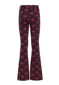 Wijde leggings van een zachte stof met een zwarte achtergrond en roze hart- en sterpatronen. Elastische tailleband voor comfort.
