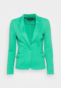 Blazer vert en tissu texturé, doté d'un col cranté, d'une fermeture à un bouton et de deux poches avant avec une coupe ajustée.