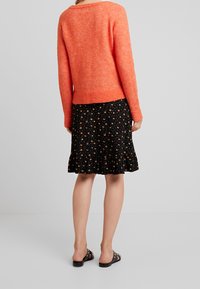 Culture Trui - orange