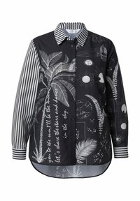 Sort skjorte med knapper foran med hvidt palmeprint, sol- og øje-motiver. Har stribede ærmer og en skjortetaillet kant. Fremstillet af glat stof.