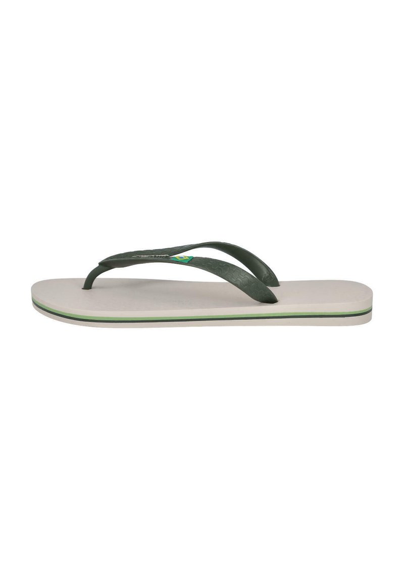 Chancla de goma verde con dos correas, superficie texturizada y planta blanca. Cuenta con un diseño delgado y una franja de acento verde en la suela.