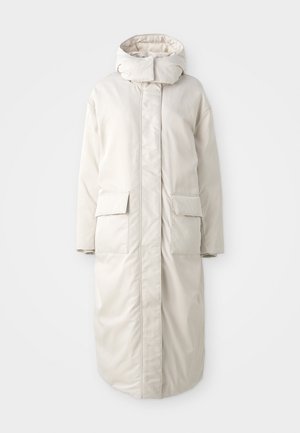 Long, oversized cream-colored coat with a high neck and hood, featuring two front pockets and a straight silhouette, smooth fabric texture.