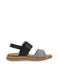 Sort lædersandal med en vævet strap i sort-hvidt mønster, justerbar bagdel og en tan- og hvid sål. Flad platformdesign.