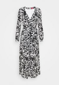 Musta-valkoinen kukallinen pitkähihaisen kietaisumekon, jossa solmittava vyö, v-kaula-aukko ja laskeutuva kangas. Mekossa on hajanaisia kukkakuvioita.