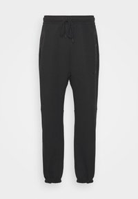 TECH FLEECE OPEN HEM PANT - Pantalon de survêtement - black