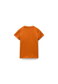 T-shirt en coton orange à manches courtes et col rond. Texture lisse, design arrière sans embellissement, coupe décontractée.