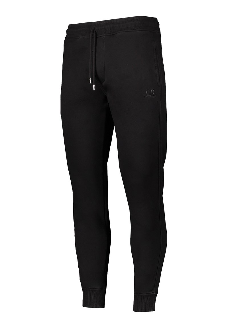 Schwarze Baumwoll-Jogginghose mit schmaler Passform, elastischem Bund, Kordelzug und seitlichen Nähten. Mit geprägtem Logo-Detail auf dem Oberschenkel.