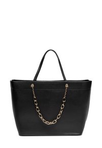 Černá kožená taška typu tote s dvojitými rukojeťmi, zdobená zlatým řetízkem připevněným na předních rukojetích.
