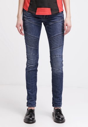 Vaqueros pitillo - destroyed denim