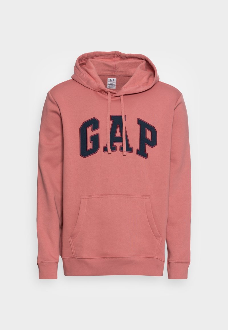Mikina s kapucí v měkké růžové látce s velkým tmavě modrým logem GAP, přední klokanková kapsa a žebrované manžety.