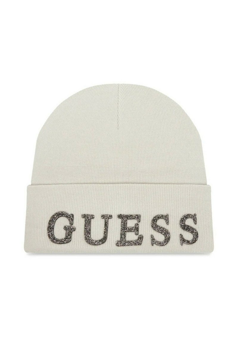 Beanie lavorato a maglia color crema con risvolto. Presenta la scritta "GUESS" in lettere metalliche argentate sul davanti. Morbido al tatto e con una vestibilità aderente.