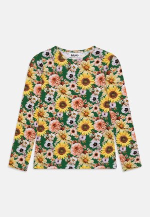 Chemise verte à manches longues avec un motif floral vibrant de tournesol, rose, blanc et orange, col rond et étiquette "Molo" à l'intérieur du col.