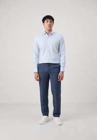 OLYMP Level Five Alkalmi ing - bleu
