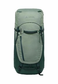 Zaino verde con tessuto testurizzato, design a carico superiore, spallacci regolabili e tasca laterale con zip. Presenta dettagli in verde scuro.