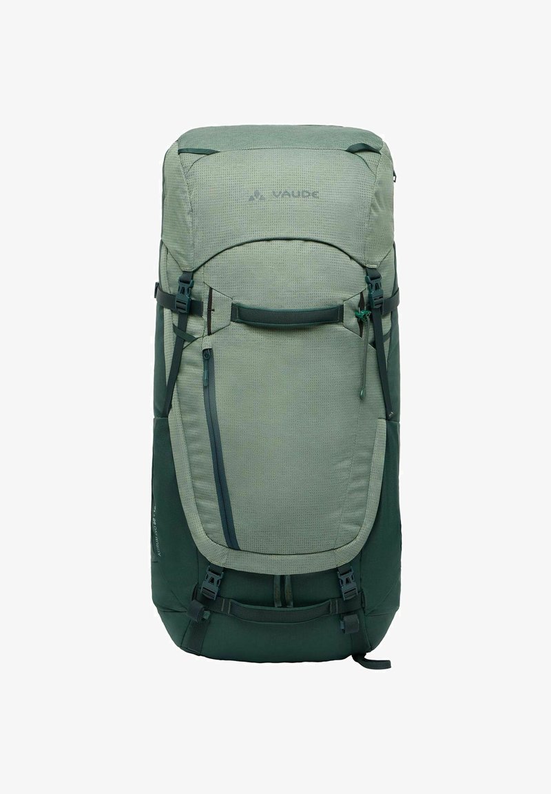Zaino verde con tessuto testurizzato, design a carico superiore, spallacci regolabili e tasca laterale con zip. Presenta dettagli in verde scuro.