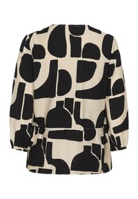 Bež bluza z dolgimi rokavi, okrašena z izrazitimi črnimi abstraktnimi geometričnimi oblikami in elastičnimi manšetami, prikazana od zadaj.