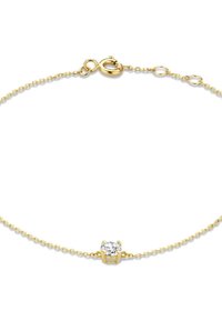 Bracelet en chaîne en or avec une seule pierre précieuse ronde et transparente dans un sertissage à quatre griffes, mettant en valeur une texture lisse et un design délicat.