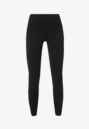 Zwarte leggings gemaakt van rekbare stof, voorzien van een hoge taille en een gestroomlijnde pasvorm zonder zichtbare naden of patronen.