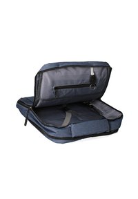 Sac à ordinateur en tissu bleu avec un intérieur gris, fermeture éclair, bandoulière ajustable et plusieurs poches pour l'organisation. L'intérieur est doublé d'un tissu doux.