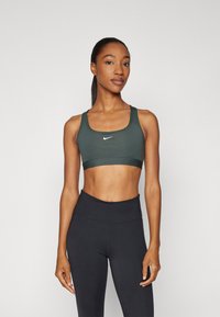 Nike Performance BRA - Sportski grudnjak s blagom potporom - vintage green/white