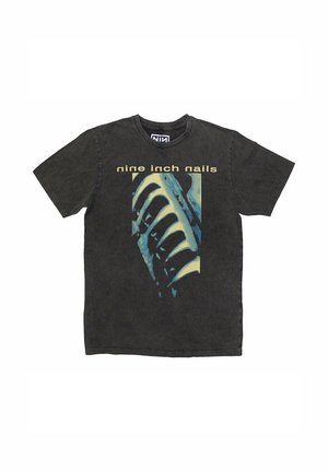 Black cotton t-shirt featuring a graphic design with a blue abstract pattern and the text "nine inch nails" in yellow. Short sleeves, crew neck.