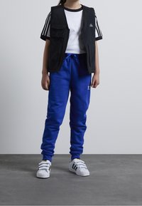 adidas Originals PANTS JUNIOR UNISEX - Träningsbyxor - semi lucid blue