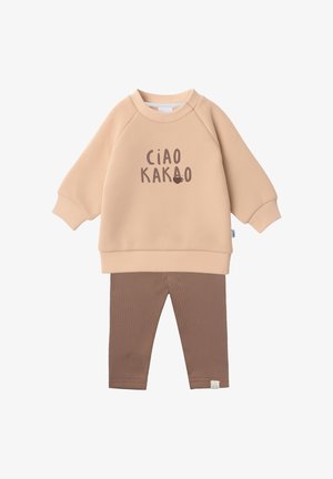Beige long-sleeve sweatshirt with "CIAO KAKAO" text and a small cup graphic, paired with ribbed brown leggings for toddlers.