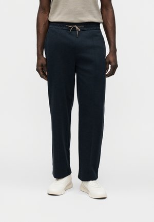 LEVETE - Pantalones deportivos - dark blue