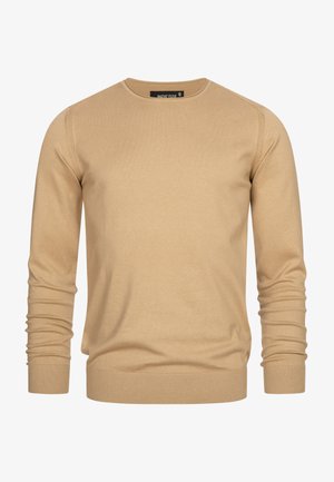 Beige crewneck sweater made of soft fabric. Features ribbed cuffs and hem, smooth texture, and a classic, unembellished design.