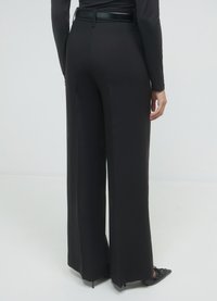 Calliope PALAZZO  - Pantalon classique - nero