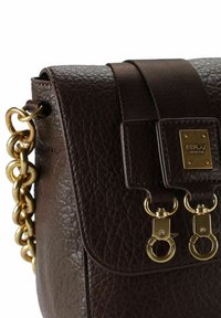 Brown leather shoulder bag with a textured finish, embellished gold hardware, dual clip closure, and a chain strap for shoulder carry.