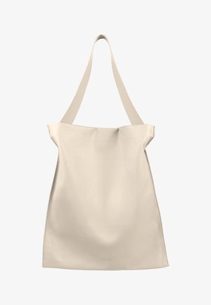 Beige leren schoudertas met een enkele band, zachte structuur, minimalistisch ontwerp en een licht geraffineerde bovenkant. Subtiel logo in reliëf aan de onderkant.