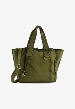 Green leather tote bag with woven edges, dual handles, and adjustable shoulder strap. Includes decorative accents and a textured finish.