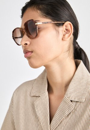 Lunettes de soleil - caramel/snow