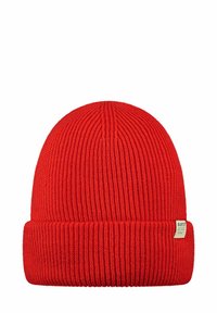 Red knitted beanie with a ribbed texture and folded cuff. Features a small branded label on the side. Soft and stretchy material.