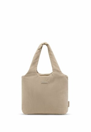 Sac cabas en velours côtelé beige avec de larges anses et une petite étiquette rectangulaire de marque centrée à l'avant.