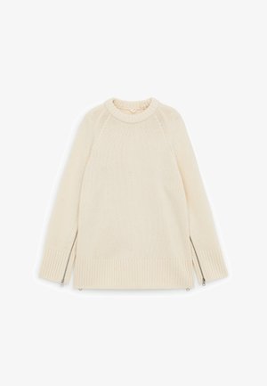 Cream-colored knit sweater with ribbed cuffs and hem, featuring silver zippers running up the outer sides of both sleeves.