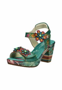 Sandalias de plataforma turquesa con acentos florales, que presentan un tacón alto con rayas de colores y una suela texturizada. Correa ajustable en el tobillo.