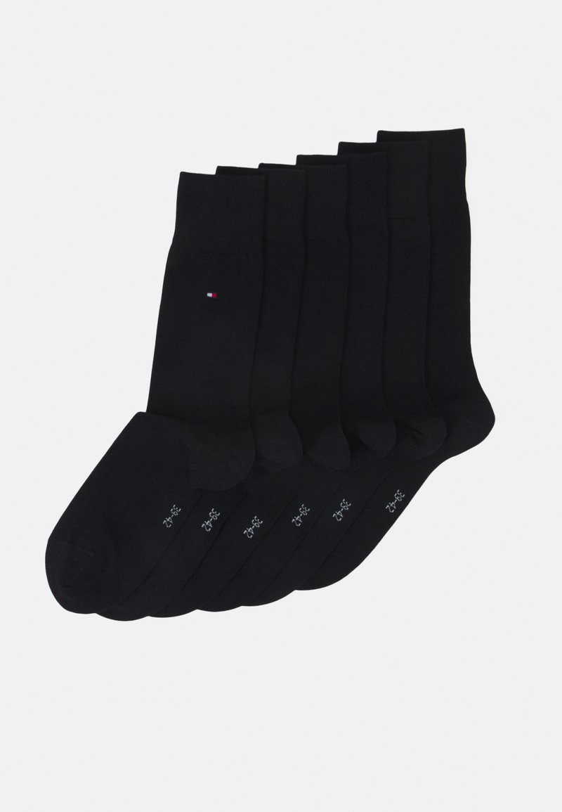 Chaussettes en coton noir, avec un design à côtes et un logo discret, au toucher doux. L'ensemble comprend plusieurs paires pour un usage quotidien.