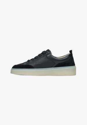 Black leather and suede sneakers with a low profile, round toe, six eyelets, and white rubber sole. Textured accents on the sides.