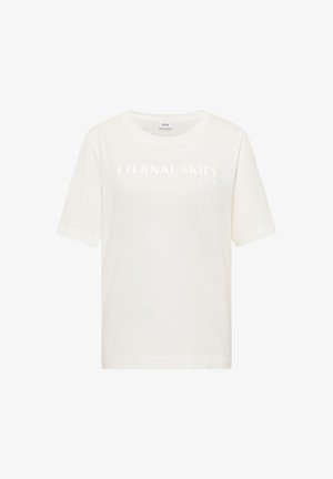 T-shirt blanc à manches courtes en tissu doux. Présente le texte imprimé "CIEUX ÉTERNELS" en gris clair sur le devant. Design classique à col rond.