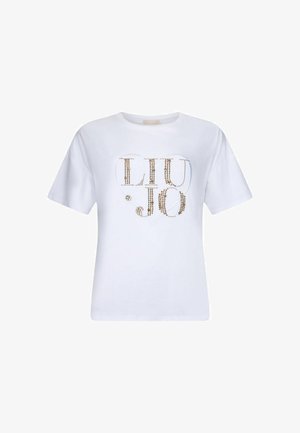 Baltas trumpomis rankovėmis, apvalios iškirptės marškinėlis su subtiliu širdies kontūru ir auksiniais kniedėtomis raidėmis „LIU JO“ ant krūtinės.