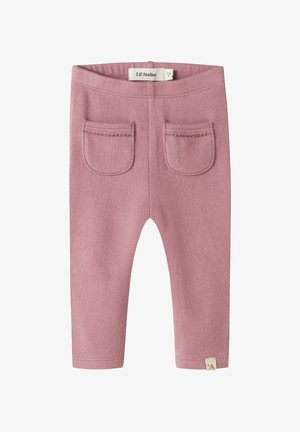 Roosa soonikuga retuusid tekstuuriga viimistlusega, millel on kaks tagumist taskut ja väike brändi silt ääres. Elastic vöökoht mugavuse tagamiseks.