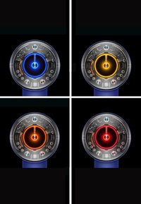Värme- och luftoscillationsanordning med cirkulär form. Har blå, gula, orange och röda ljusindikatorer; genomskinlig hölje; metalliska detaljer.