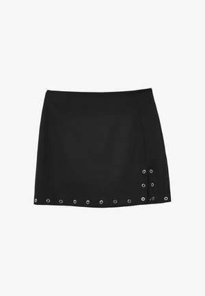 Black mini skirt with metal eyelets along the hem and right side seam, featuring a slight slit on the right side.