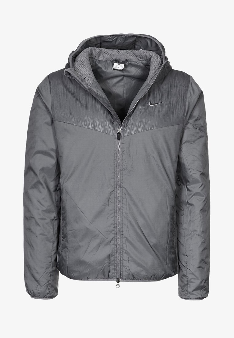 Veste à capuche grise Nike avec fermeture éclair frontale complète, panneau texturé sur la partie supérieure de la poitrine et doublure intérieure douce.