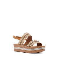 Woven tan platform sandals with two wide straps, brown base, and silver striped accent on the sole. Adjustable ankle strap for fit.