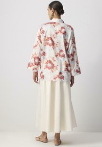 Touché Privé PATTERNED - Button-down blouse - orange