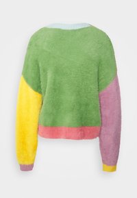 Colorful sweater featuring green, yellow, pink, and purple sections; plush texture, rounded neckline, and long sleeves.